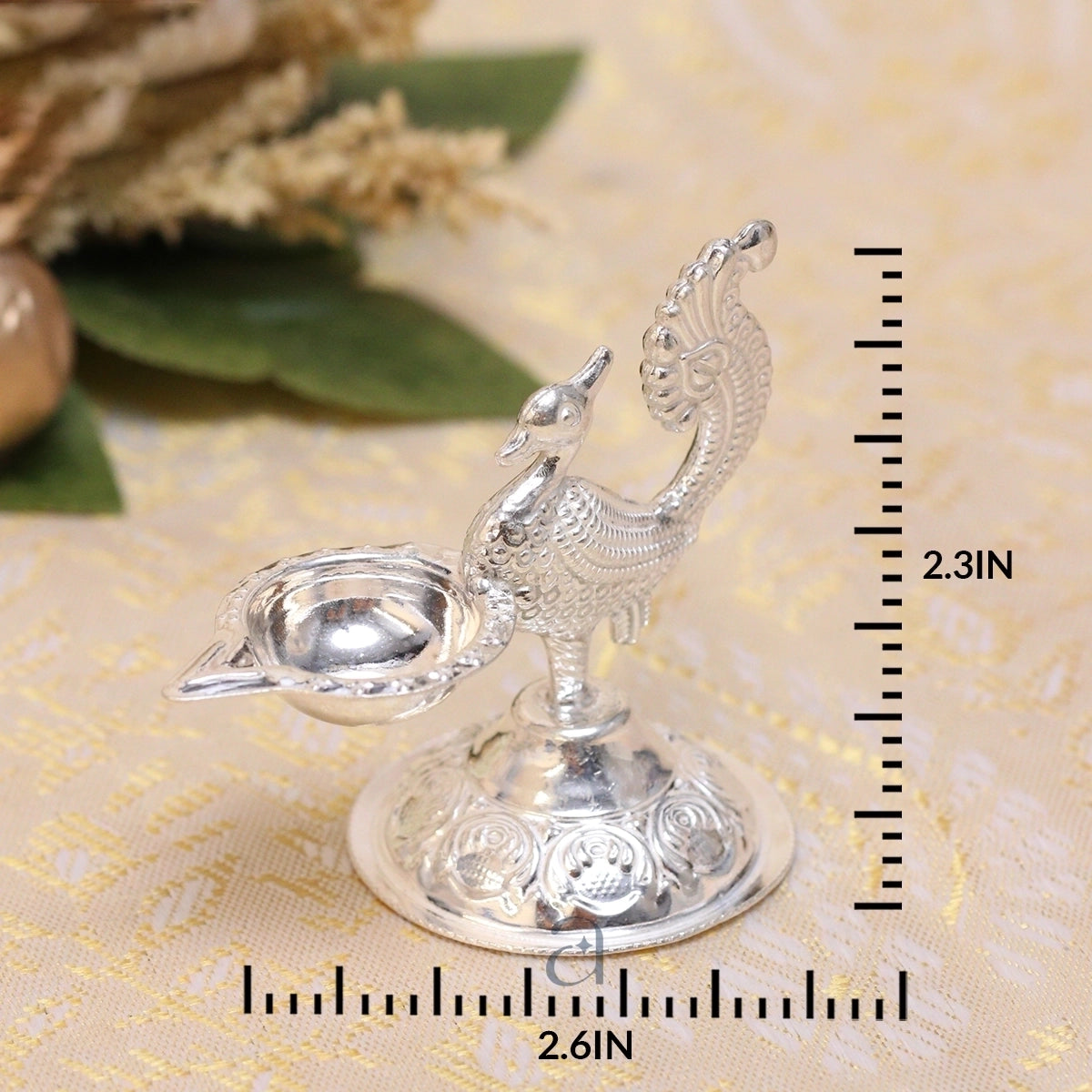 Silver Niranjan with Intricate Peacock Motif