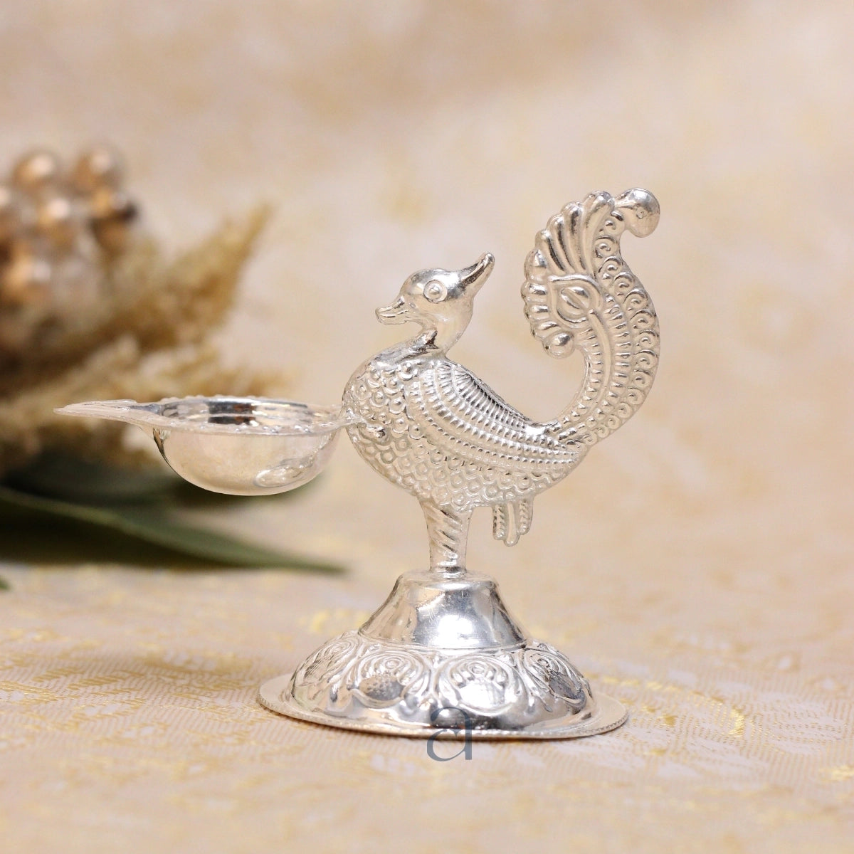 Silver Niranjan with Intricate Peacock Motif