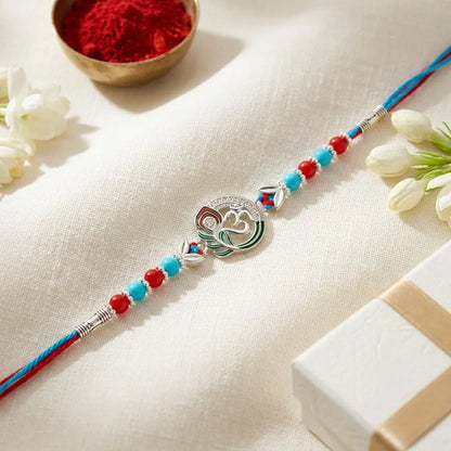 92.5 Silver Om &amp; Peacock Feather Rakhi